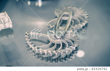 Object printed on metal 3d printer close-up. Object printed on metal 3d printer close-up. 65426792