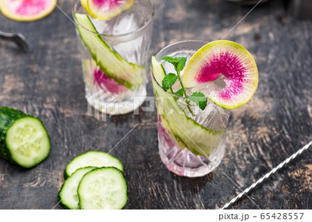 Cocktail with cucumber and radish 65428557