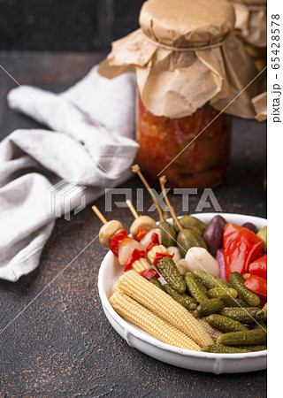 Assortment of marinated or pickled vegetable. 65428578