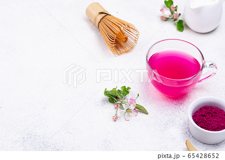 Pink matcha tea from dragon fruit 65428652