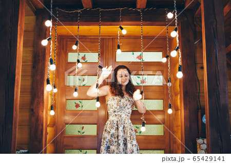 girl among the lamps spend time in self-isolation. interior decoration 65429141
