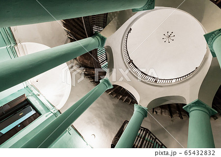 Round stairwell interior of an old apartment house Round stairwell interior of an old apartment house 65432832