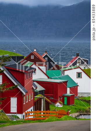 Gjogv village near the ocean and islands in Faroe Islands Gjogv village near the ocean and islands in Faroe Islands 65433889