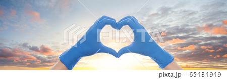 Heart against sky clouds background.  65434949