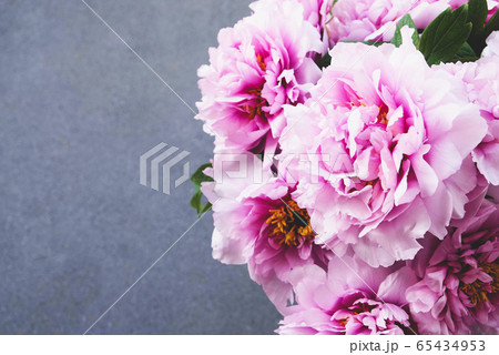 Heap of fresh beautiful purple pink peony flowers 65434953