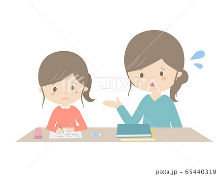 A girl learning at home while being told by her A girl learning at home while being told by her 65440319