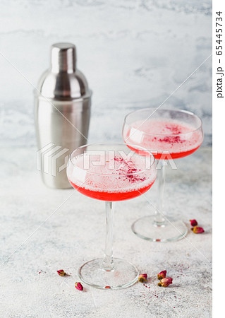 Pink Raspberry Cocktail in drink glass Pink Raspberry Cocktail in drink glass 65445734