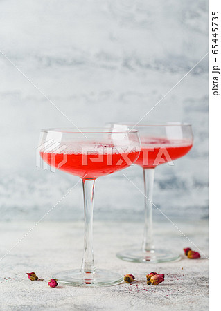 Pink Raspberry Cocktail in drink glass Pink Raspberry Cocktail in drink glass 65445735