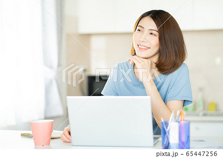 A business woman working at home A business woman working at home 65447256