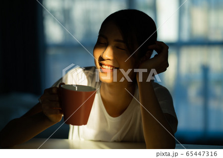 A woman at home 65447316