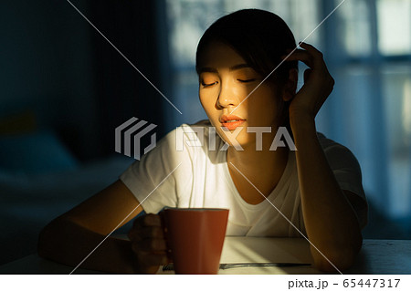 A woman at home 65447317