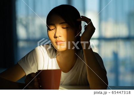 A woman at home 65447318