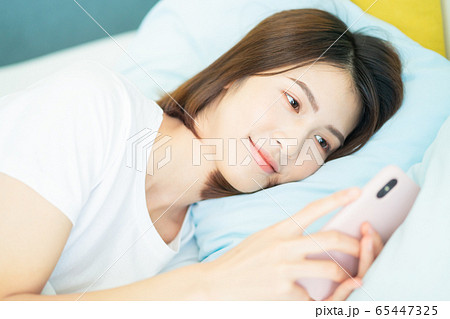 A woman at home A woman at home 65447325