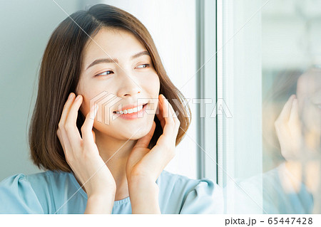 A beautiful woman at home A beautiful woman at home 65447428