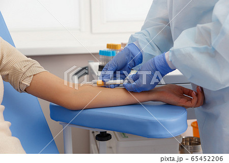 Nurse taking Real Blood samples 65452206