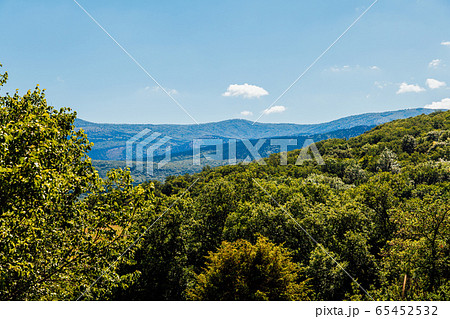 beautiful landscape green forest mountains blue sky beautiful landscape green forest mountains blue sky 65452532