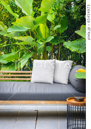 Comfortable pillow on sofa chair 65454973