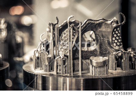 Object printed on metal 3d printer close-up 65458899