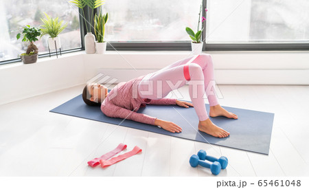 Resistance bands exercise glute bridge leg workout with loop band for strength training of legs and booty fitness 65461048