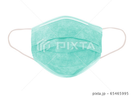 Fight coronavirus Covid-19. Medical use surgical face mask for protect against virus and bacteria. Green colour 3 layer protective surgical mask isolated - image Fight coronavirus Covid-19. Medical use surgical face mask for protect against virus and bacteria. Green colour 3 layer protective surgical mask isolated - image 65465995