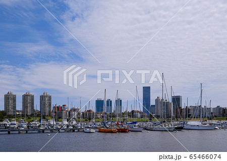The view of Montevideo skyline from Buceo Port Pier Harbor crowed of small fishing boats and ships, Montevideo Uruguay The view of Montevideo skyline from Buceo Port Pier Harbor crowed of small fishing boats and ships, Montevideo Uruguay 65466074