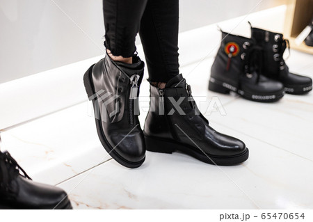 Young fashion woman in black stylish jeans Young fashion woman in black stylish jeans 65470654