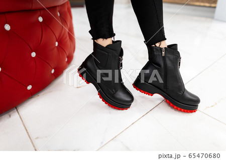 Modern young woman in black stylish jeans Modern young woman in black stylish jeans 65470680