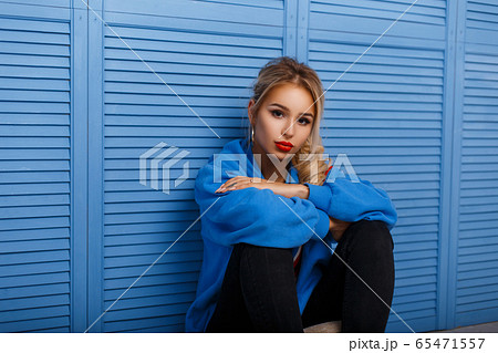 Young beautiful blond woman with red lips  65471557