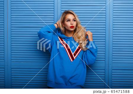 Beautiful young blond woman with bright make-up 65471588
