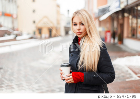 Pretty glamorous model girl with coffee Pretty glamorous model girl with coffee 65471799