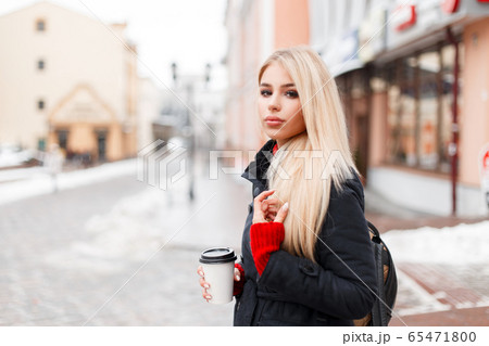 Stylish fashion model woman with coffee  65471800