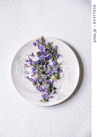Edible flowers on plate Edible flowers on plate 65477658
