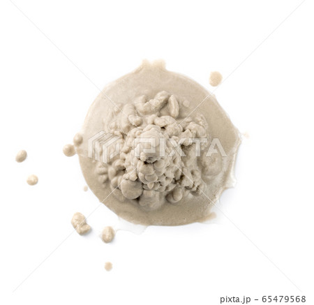 Sandy beach textured pile isolated on white 65479568