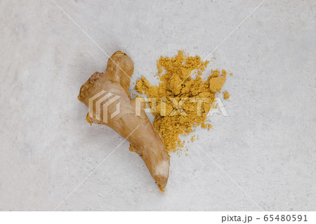 Ginger root and ginger powder flat lay in the 65480591