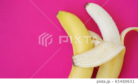 The concept of a friendly couple. Banana like a husband embraces another one 65480631