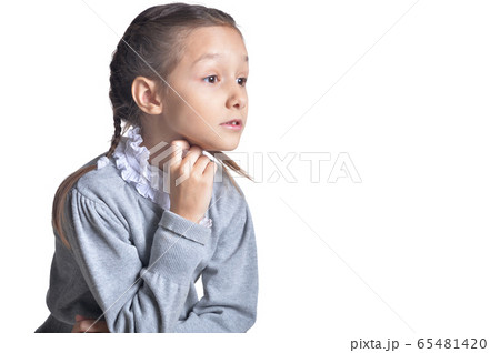Portrait of cute little girl posing isolated on white background 65481420