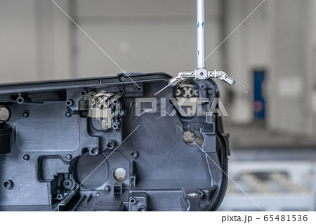 3D measuring device in a factory for the production of plastic castings for the automotive industry 3D measuring device in a factory for the production of plastic castings for the automotive industry 65481536