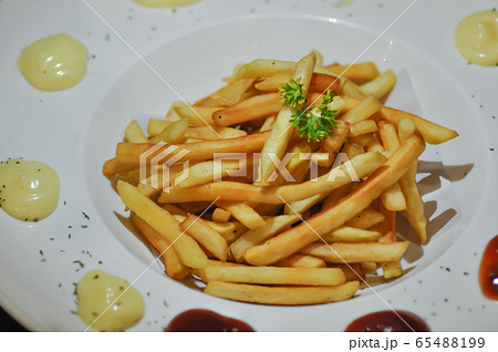 French fries dish or fried potato French fries dish or fried potato 65488199