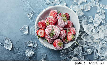 Frozen strawberry with crystals of ice 65495674