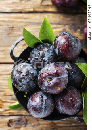 Sweet red plums 65497598