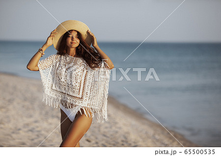 Woman Resting on the Beach During Vacation 65500535