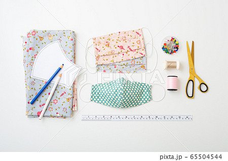 Cotton face mask with  sewing accessories on white 65504544