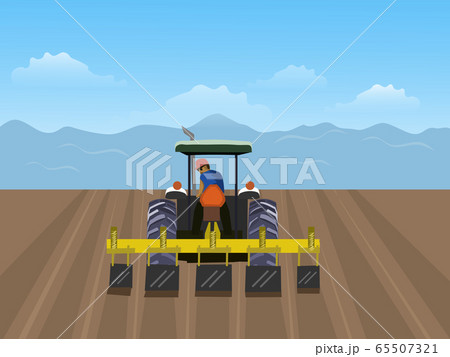 The man is driving tractor. In order to plow the soil in the field. Have a blue sky background The man is driving tractor. In order to plow the soil in the field. Have a blue sky background 65507321