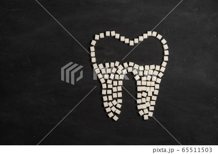 Sugar destroy tooth enamel leads tooth decay Sugar 65511503