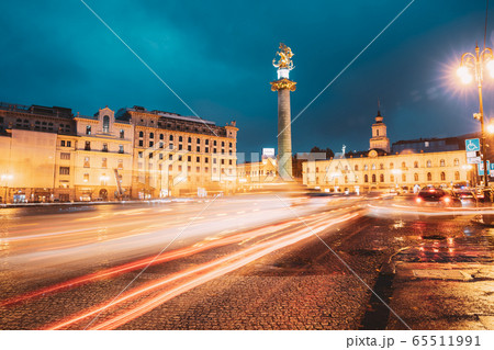 Tbilisi, Georgia, Eurasia. Liberty Monument Depicting St George Slaying The Dragon And Tbilisi City Hall In Freedom Square In City Center. 65511991