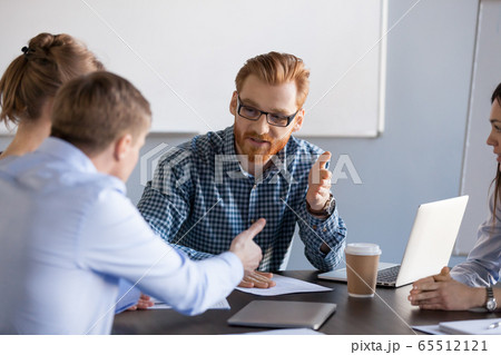 Serious business men having discussion, dispute or disagreement Serious business men having discussion, dispute or disagreement 65512121