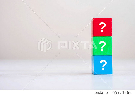 Questions Mark ( ? ) on wooden cube block on table Questions Mark ( ? ) on wooden cube block on table 65521266