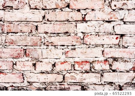 Texture of a brick wall with cracks Texture of a brick wall with cracks 65522293