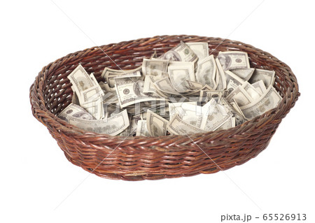Basket with dollars isolated on white background 65526913