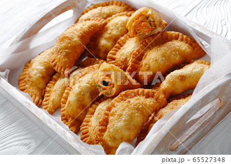 close-up of deep fried Buffalo Chicken Empanadas close-up of deep fried Buffalo Chicken Empanadas 65527348